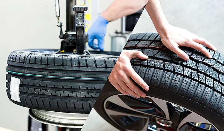 Mechaniker wechselt Autoreifen in der Werkstatt
